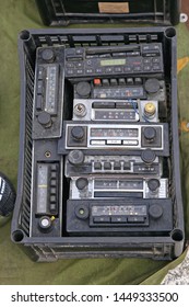 Old Car Stereo Radios In Crate At Flea Market