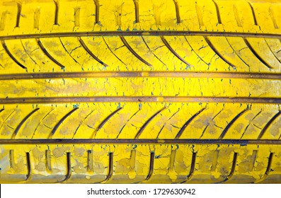 Old Car Tire Painted In Various Colors. Unusual Background And Texture. Computer Desktop Wallpaper.
