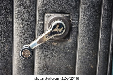 Old Car Window Hand Crank - Close-up. Vintage