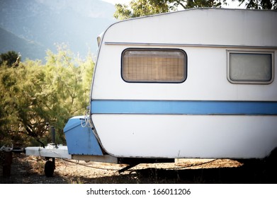 Old Caravan Parked In A Campsite