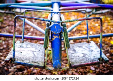 Old Carousel At A Playground - Photo