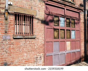 Old Carriage Garage Door Brick Building In Manhattan New York City