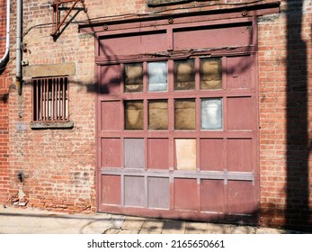 Old Carriage Garage Door Brick Building In Manhattan New York City