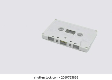 old cassette tape Old cassette tapes used to record music and pictures, video is now out of use. On a white background, isolates.
