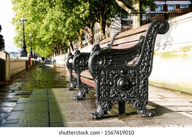 Old Cast Iron Bench On The River Embankment