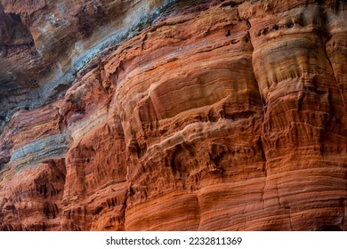 The “Altschlossfelsen“ or "Old Castle Rocks" is a rock outcrop formed of bunter sandstone in the Palatine Forest of Germany, near the border with France. Colorful layers in shades of grey, brown, red. - Shutterstock ID 2232811369