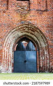 Old Castle Stone Wall With Closed Big Metal Doors. Vintage Gates. Retro Doors, Rock Castle