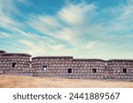 The old castle walls and the blue sky are in harmony.