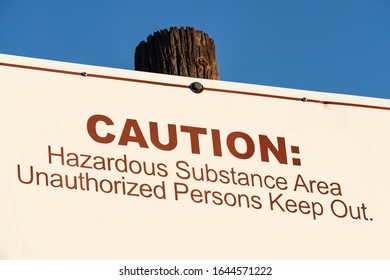 Old Caution Hazardous Substance Area Unauthorized Persons Keep Out Sign.  