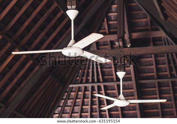 Old Ceiling Fan Hanging Under Wooden Miscellaneous Objects