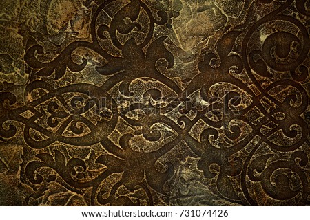 Old celtic pattern texture on stone with Moss - vintage background. Natural stone with antique celtic symbols. Mythological Seamless pattern design in medieval style.