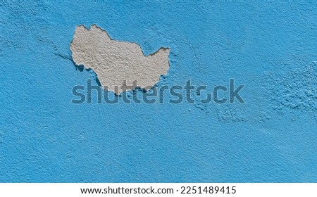 Old cement Wall Peel exterior Background with blue Paint peeling low quality, Cracked Wall