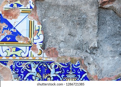 Old ceramic tiles. Blue and white tile. Mediterranean mosaic. Azulezhu. Wreck tiles. Spain. Spanish pattern.