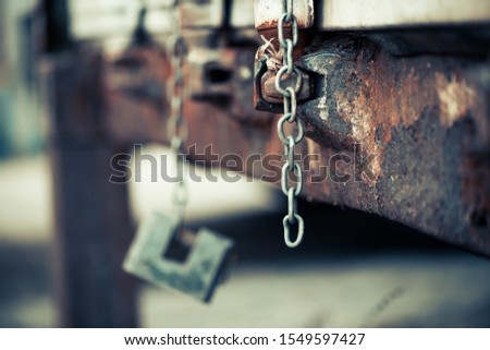 old chain and lock of rustic container closeop