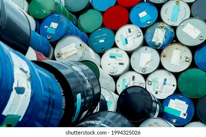 Old Chemical Barrels. Blue, Red, And Green Chemical Drum. Steel Tank. Hazard Chemical Barrel With Flammable Liquid Warning Label. Industrial Waste. Isopropyl Alcohol And Aluminized Organosol Barrels.