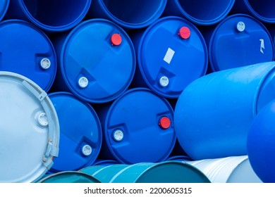 Old Chemical Barrels. Empty Blue Chemical Drums Stack. Steel And Plastic Oil Tank. Toxic Waste Warehouse. Hazard Chemical Barrel. Industrial Waste In Drum. Hazard Waste Storage In Factory. 