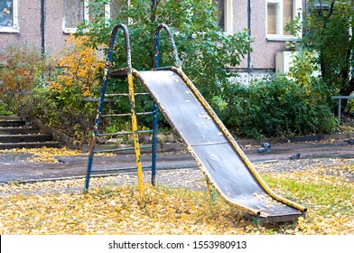 Old Childrens Metal Slide With Peeling Paint