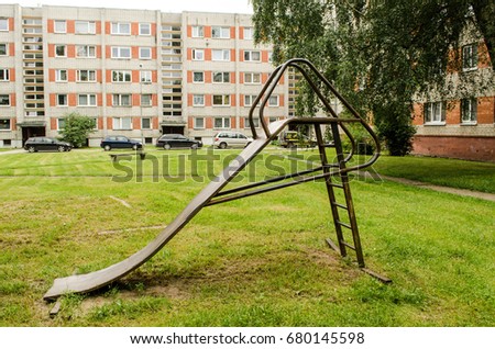 Old children's slide in the yard
