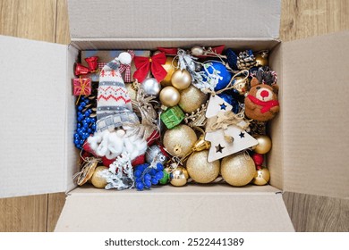 Old Christmas decorations and toys in box. Storage of Christmas tree toys. Box of many old toys. - Powered by Shutterstock