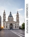 Old church, cathedral in a historic old town in Eastern Europe. Sunrise on an urban square in front of St. Stephen