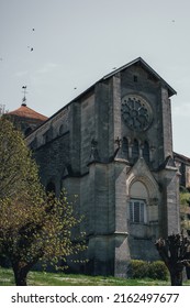 Old Church Crypt In European Countryside With Birds Flying In The Sky 