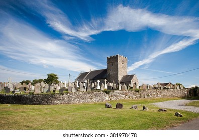 Old Church In Ireland With Graveyard And Beautiful Clouds 