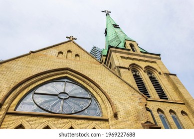 Old Church Steeple Against Cloudy Sky