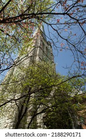 Old Church Steeple Visible Through Trees