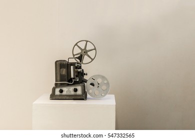 Old Cinema Projector On White Background