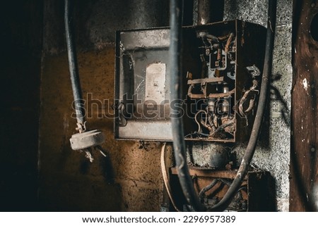 Old circuit breaker in an abandoned garage