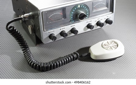 Old Citizens Band Radio With A Microphone On A Rubber Mat