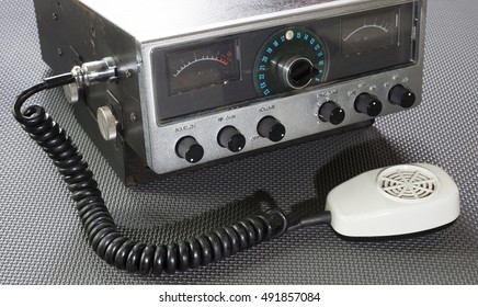 Old Citizens Band Radio On A Rubber Mat With Original Microphone