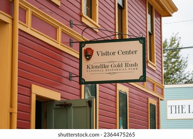 Old city center of Skagway, Alaska - Vintage store signboards on Broadway, the main shopping street of the Klondike Gold Rush National Historic Park