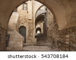 Old city hidden passageway, stone stairway and arch. Jerusalem, Israel