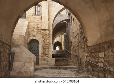 Old city hidden passageway, stone stairway and arch. Jerusalem, Israel