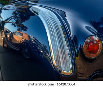 Old Classic Car   Reflected In The Bodywork Of Another Classica Car