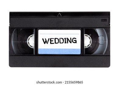 Old classic traditional VHS cassette tape archival wedding recording family souvenir 80s 90s self recorded movie, video media storage device, top view, front, isolated on white, object cut out, nobody