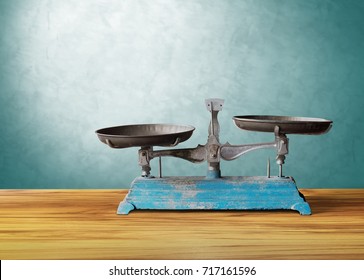 old classic vintage scale on wooden table, justice