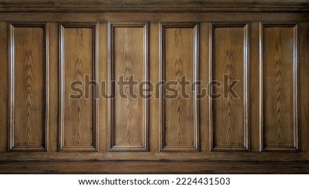 Old classic wall with vintage brown beech wood panels . Joinery in the interior. Background.