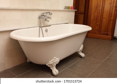 
Old Clawfoot Tub In A Retro Bathroom