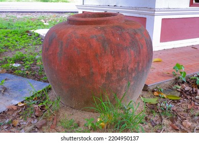 Old Clay Jar Was Left On The Ground Beside The Road