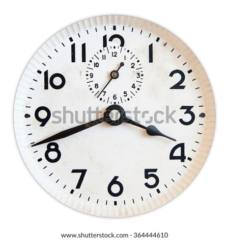 Old clock face isolated on white