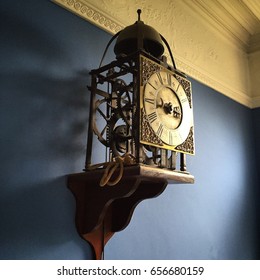 Old clock hung on the wall Victorian house England uk
