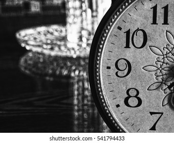 Old clock on the table retro vintage background view closeup time generation fashion 50s 60s 70s 80s
