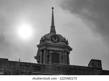 Old Clock Tower Against Cloudy Sky
