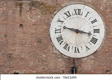 Old Clock Tower In Siena Medieval Town