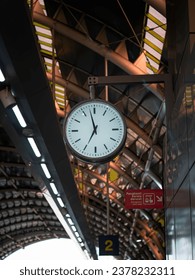 Old clock train at station