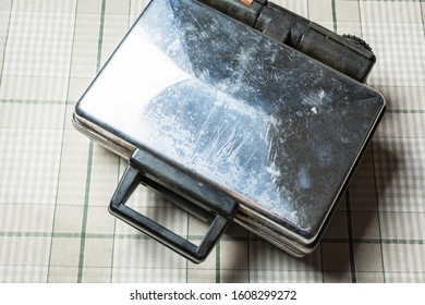 Old Closed Waffle Iron On Kitchen Table