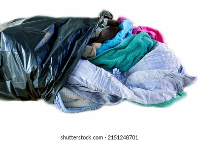 Old Clothes Are Packed In Garbage Bags For Disposal.