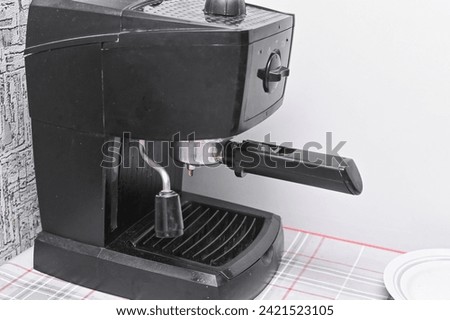 an old coffee machine in the kitchen